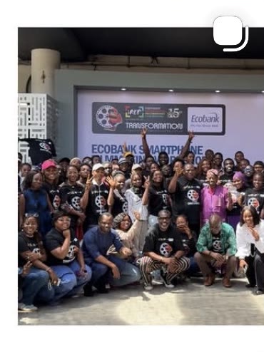A group photograph of the Ecobank smartphone filmmaking workshop cohort with arms raised.